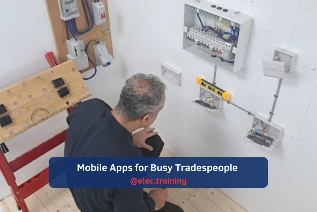 Trainees wiring sockets and switches during a first-fix workshop session