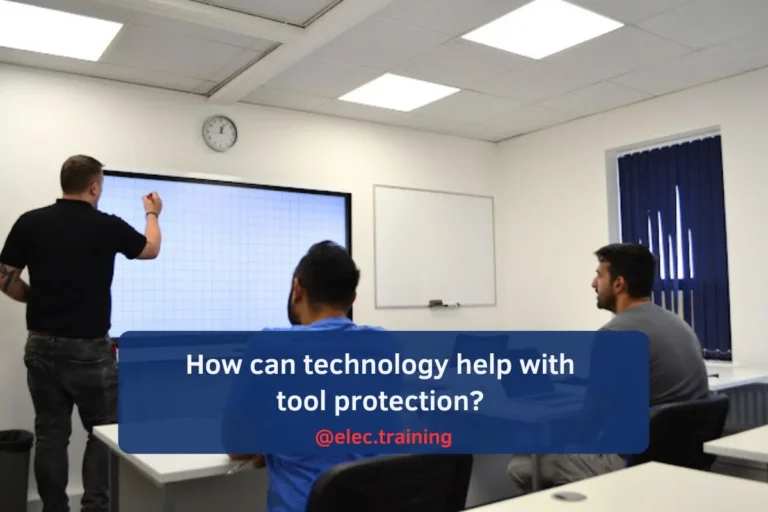 Trainer explaining electrical theory to learners on whiteboard