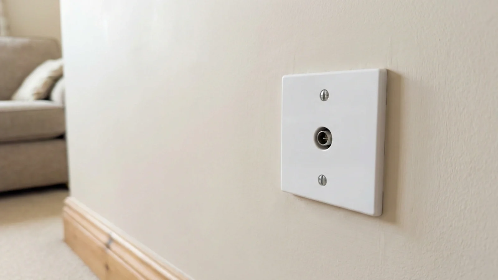 Completed TV point installation with faceplate securely mounted