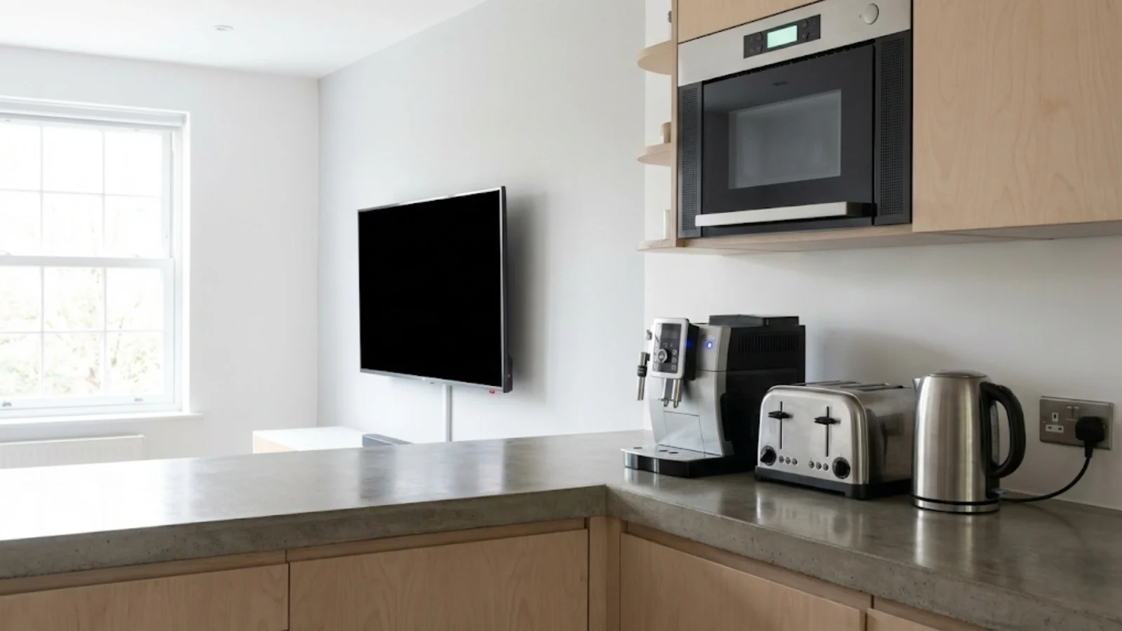 Modern household appliances on standby showing typical UK home setup